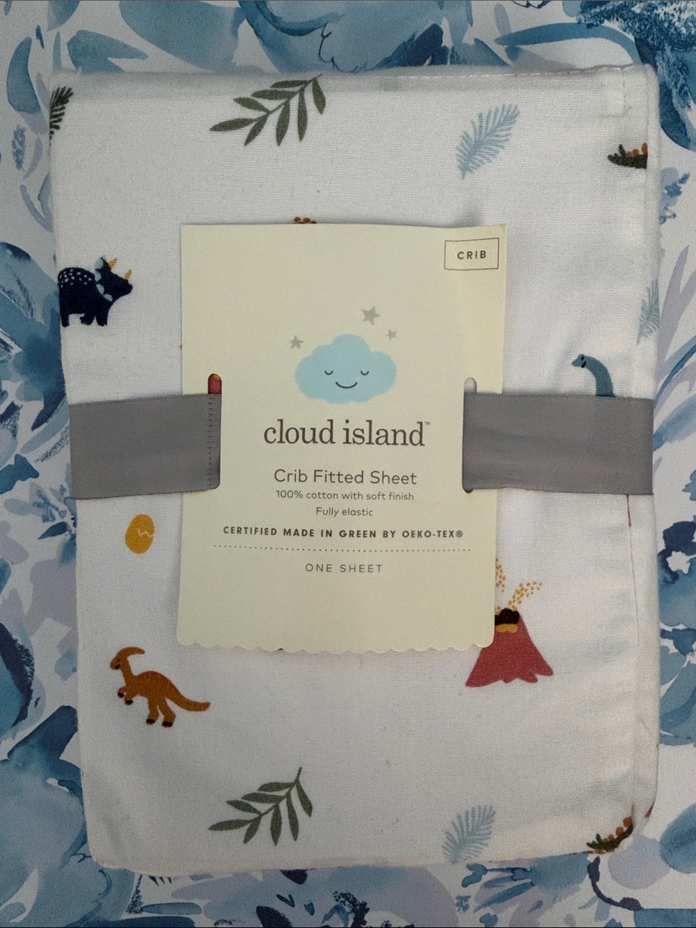 cloud island White Crib Sheet with Colorful Dino and Leaf Print